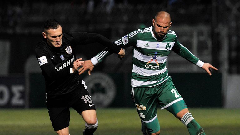 PAOK 's Perez (left) in action before his move back to Spain in 2014