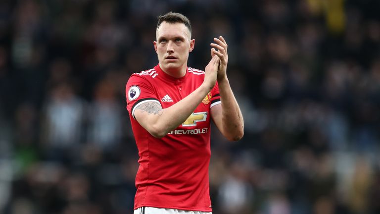 Phil Jones applauds fans after Manchester United's match at Newcastle