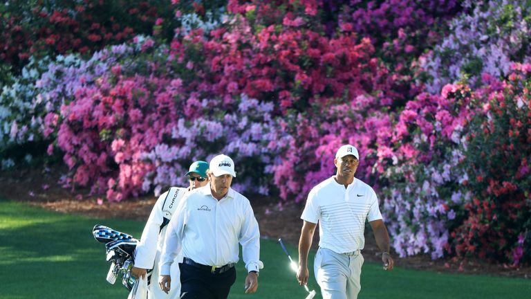 Phil Mickelson and Tiger Woods during a practice round prior to the start of the 2018 Masters Tournament at Augusta National Golf Club on April 3, 2018 in Augusta, Georgia.