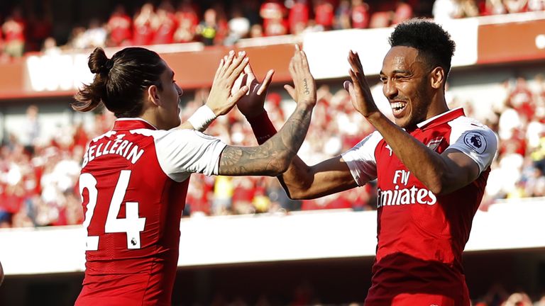 Pierre-Emerick Aubameyang is congratulated by Hector Bellerin after scoring Arsenal's fifth goal