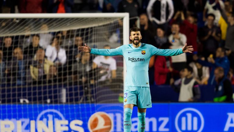 Gerard Pique shows his disgust as Barcelona slip to defeat against Levante