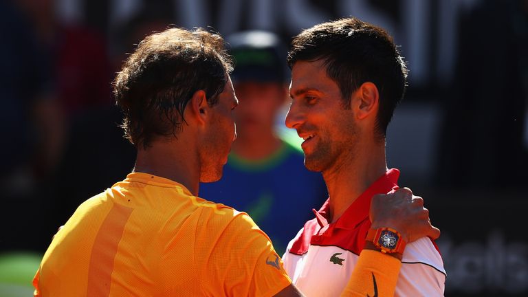 Rafael Nadal of Spain and Novak Djokovic of Serbia embrace after their semi final match during day 7 of the Internazionali BNL d'Italia 2018 tennis at Foro Italico on May 19, 2018 in Rome, Italy. 