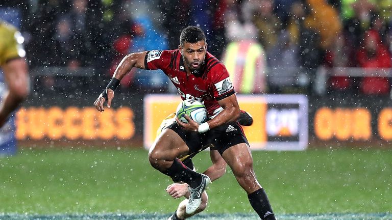  Richie Mo'unga makes a break for the  Crusaders