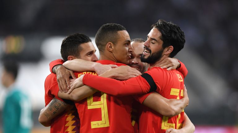 Rodrigo is congratulated by his Spain team-mates in Dusseldorf