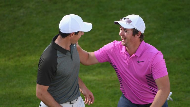 Rory McIlroy and Sam Horsfield during the third round of the BMW PGA Championship at Wentworth