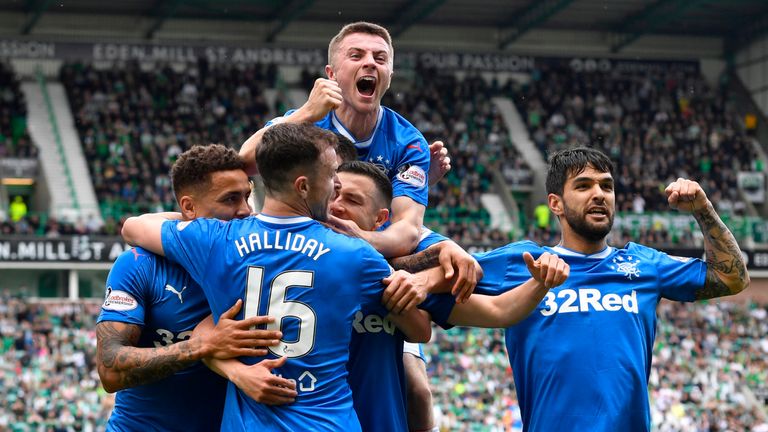 Rangers' players celebrate after Jason Holt makes it 4-3.