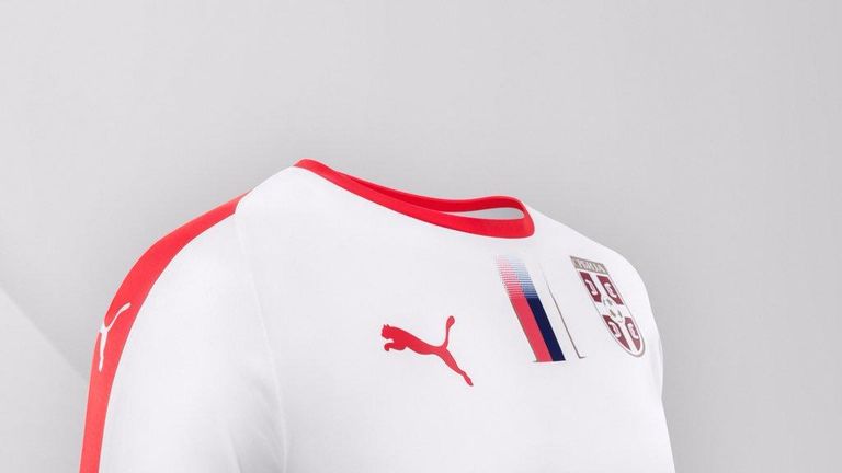 Serbia's away shirt is white with a red crew-neck, with a red stripe running down the sleeve