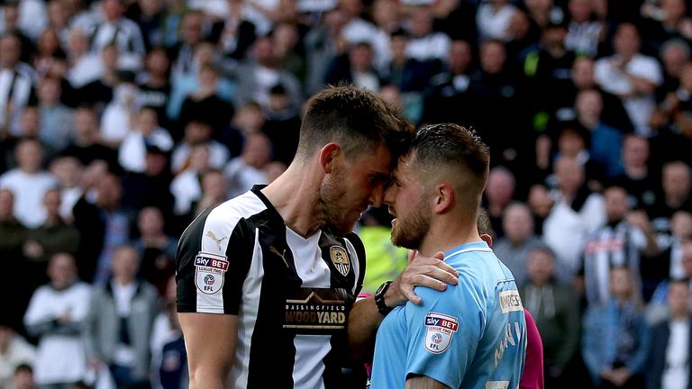 Notts County's Shaun Brisley (left) and Coventry City's Marc McNulty (right) go head to head during the Sky Bet League Two play-off semi-final second leg