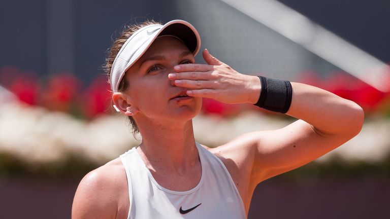 Simona Halep of Romania celebrates after her straight sets victory over Elise Mertens of Belgium in the 2nd Round match during day four of the Mutua Madrid Open tennis tournament at the Caja Magica on May 8, 2018 in Madrid, Spain. 