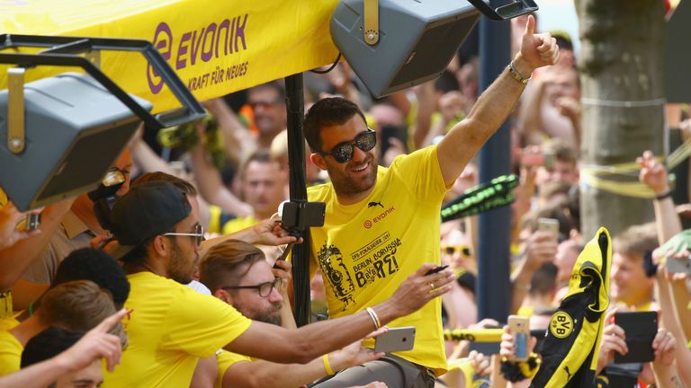 Sokratis celebrates Dortmund's DFB-Pokal triumph in 2017 during a parade