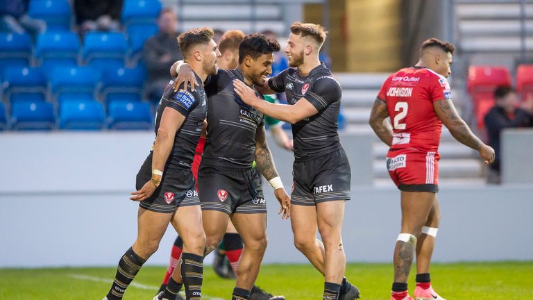 Picture by Allan McKenzie/SWpix.com - 26/04/2018 - Rugby League - Betfred Super League - Salford Red Devils v St Helens - AJ Bell Stadium, Salford, England - St Helens's Ben Barba is congratulated on scoring a try against Salford by team mates.