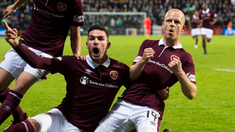 Steven Naismith (R) celebrates after making it 2-1 to Hearts