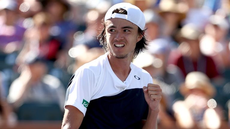 Taro Daniel of Japan celebrates a point against Novak Djokovic of Serbia during the BNP Paribas Open at the Indian Wells Tennis Garden on March 11, 2018 in Indian Wells, California.