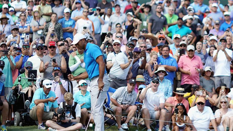 Tiger Woods got his round back on track with an eagle at the ninth