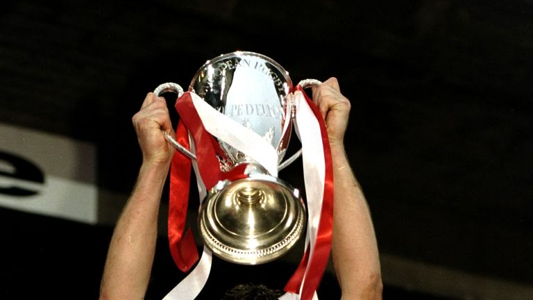Ulster full-back Simon Mason lifts the 1999 trophy after a flawless kicking display in Dublin 