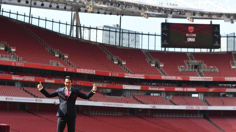 New Arsenal Head Coach Unai Emery poses for photographs at the Emirates Stadium on May 23, 2018