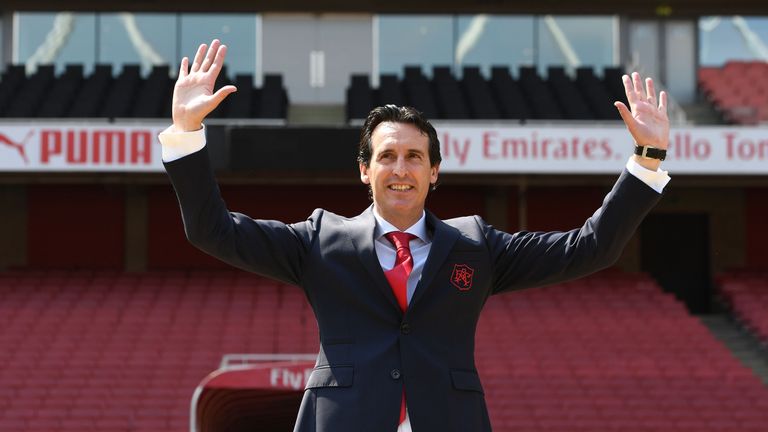 New Arsenal Head Coach Unai Emery poses for photographs at the Emirates Stadium on May 23, 2018