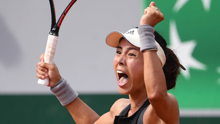 China's Wang Qiang celebrates after victory over Venus Williams of the US in their women's singles first round match on day one of The Roland Garros 2018 French Open tennis tournament in Paris on May 27, 2018. 