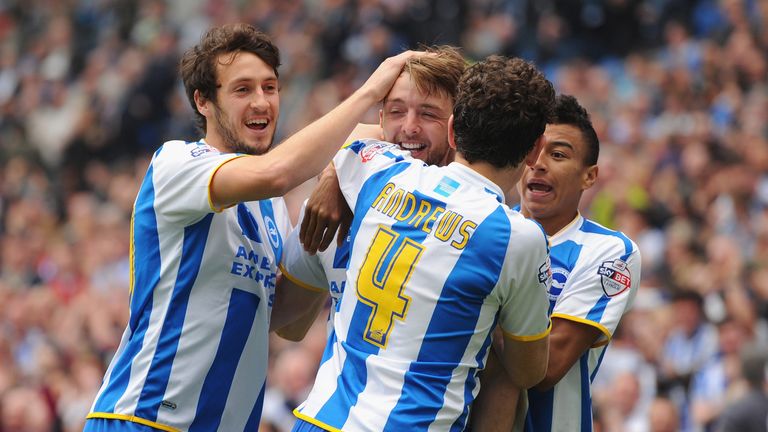 Will Buckley, Dale Stephens, Keith Andrews and Jesse Lingard celebrate during the Sky Bet Championship match between Brighton & Hove Albion and Blackpool at Amex Stadium on April 21, 2014 in Brighton, England