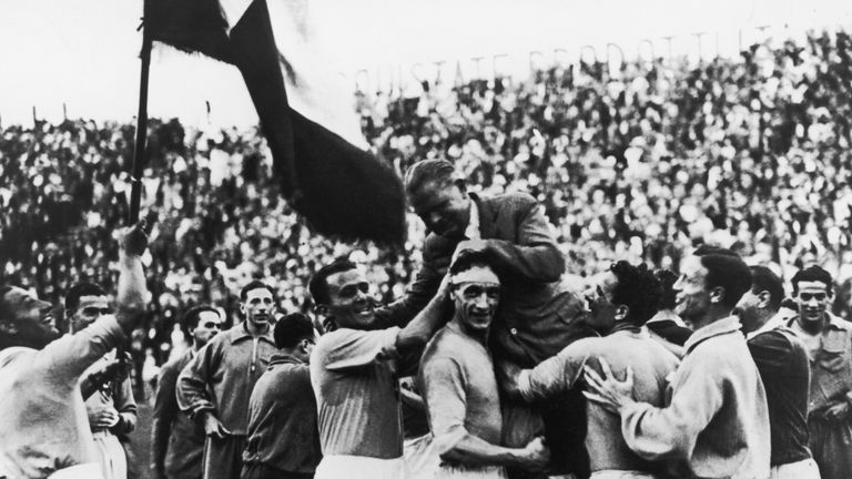 The Italian World Cup squad carry their manager, Vittorio Pozzo (1886 - 1968), shoulder high following their 2-1 victory over Czechoslovakia after extra time in the World Cup final in Rome