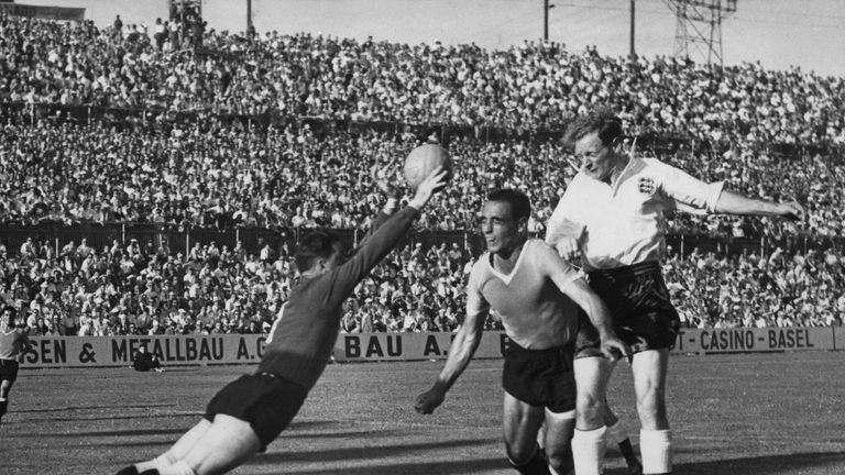 Goalkeeper Roque Gaston Maspoli makes a save from Tom Finney as Omar Oscar Miguez defends during the quarter final match between England and Uruguay in the 1954 World Cup, St Jakob Stadium, Basel, 27th June 1954 . England lost 4-2