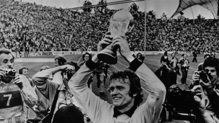 German goalkeeper Sepp Maier holds the World Cup Trophy aloft, after West Germany's 2-1 victory over Holland in the 1974 World Cup Final