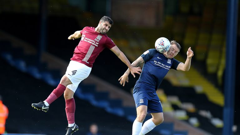 Northampton's Yaser Kasim battling for the ball with Southend's Simon Cox during the Sky Bet League One match at Roots Hall on September 16, 2017 in Southend, England.