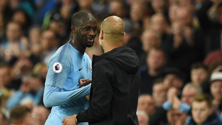 Pep Guardiola congratulates Yaya Toure after substituting him late in final game against Brighton