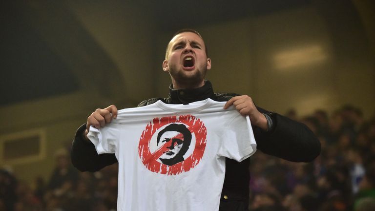 A supporter shows a T-shirt with a portrait of Zdravko Mamic during the Euro 2016 qualifying football match Italy vs Croatia on November 16, 2014 at the San Siro stadium in Milan. 