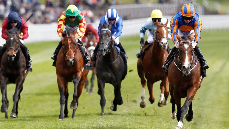 Idaho (right) ridden by Ryan Moore on their way to winning the Boodles Diamond Ormonde Stakes
