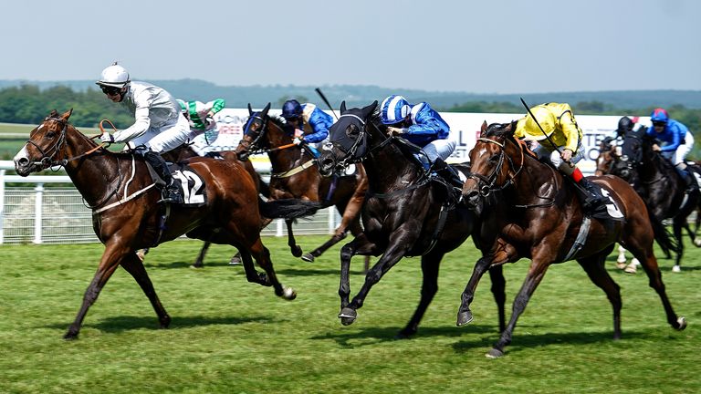 CHICHESTER, ENGLAND - MAY 25: Andrea Atzeni riding Society Power (R, yellow) win The Netbet Sport Handicap Stakes at Goodwood Racecourse on May 25, 2018 in Chichester, United Kingdom. (Photo by Alan Crowhurst/Getty Images)