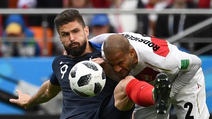 Olivier Giroud and Alberto Rodriguez in action at the Ekaterinburg Arena