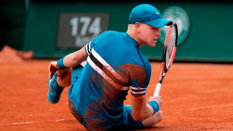 Kyle Edmund takes a tumble during his third-round match with Fabio Fognini