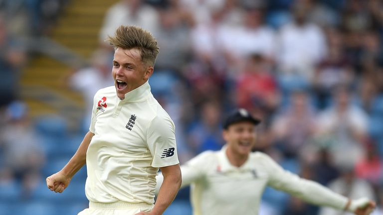 Sam Curran celebrates after dismissing Shadab Khan