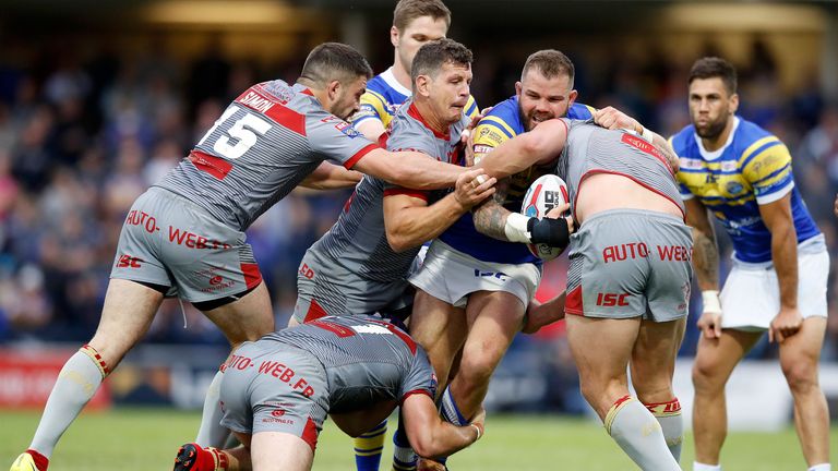 Adam Cuthbertson is tackled against Catalans Dragons