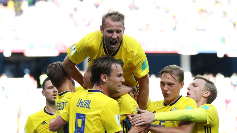 Sweden captain Andreas Granqvist is mobbed by teammates after putting them 1-0 up in their group F encounter with Korea Republic