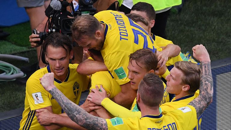 Sweden captain Andreas Granqvist is mobbed by teammates after putting them 1-0 up in their group F encounter with Korea Republic