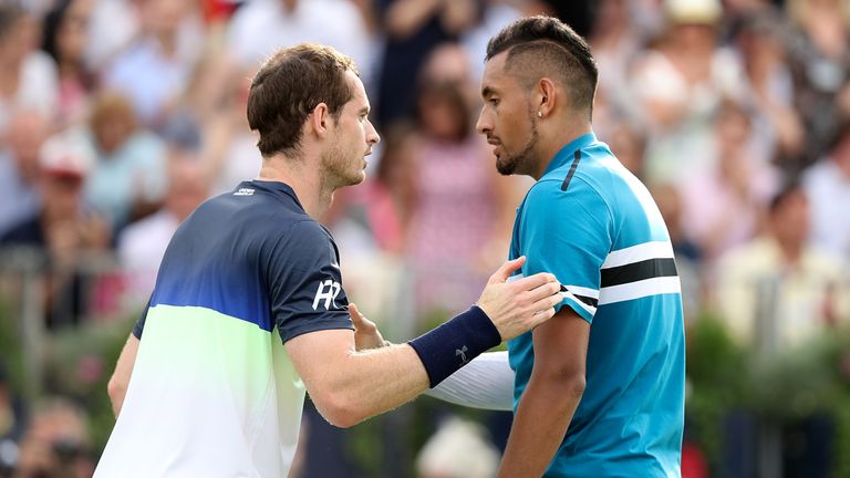 Andy Murray of Great Britain and Nick Kyrgios of Australia shake hands following their match on Day Two of the Fever-Tree Championships at Queens Club on June 19, 2018 in London, United Kingdom.
