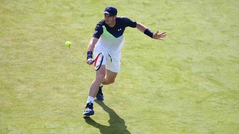 Andy Murray of Great Britain plays a backhand during his match against Nick Kyrgios of Australia on Day Two of the Fever-Tree Championships at Queens Club on June 19, 2018 in London, United Kingdom