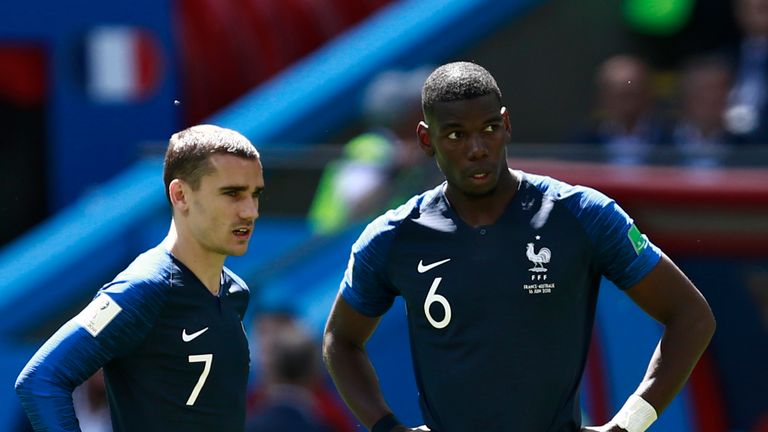 Antoine Griezmann and Paul Pogba discuss their options for a freekick