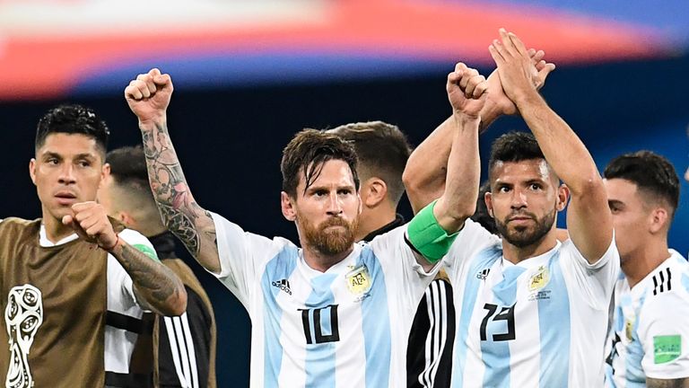 Lionel Messi and Sergio Aguero celebrate after Argentina's win against Nigeria