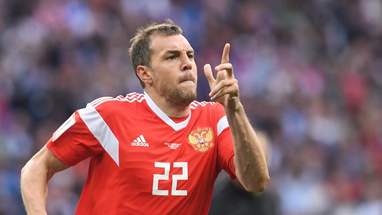 Artem Dzyuba celebrates after scoring Russia&#39;s third goal