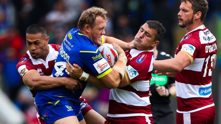 Picture by Alex Whitehead/SWpix.com - 02/06/2018 - Rugby League - Ladbrokes Challenge Cup Quarter Final - Warrington Wolves v Wigan Warriors - Halliwell Jones Stadium, Warrington, England - Warrington's Ben Westwood is tackled by Wigan's Ben Flower and Willie Isa.