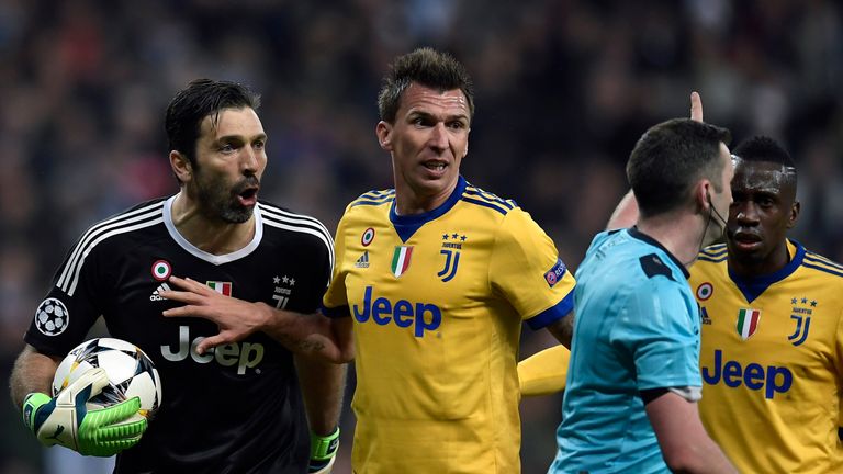 Buffon reacted angrily towards referee Michael Oliver