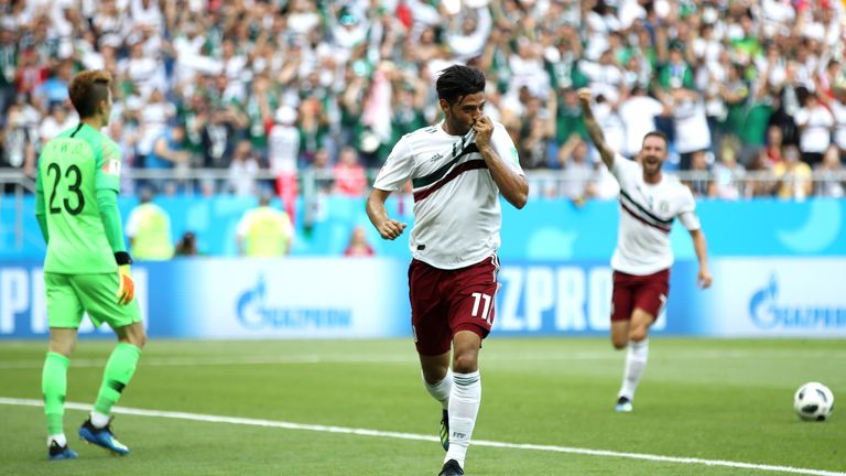 Carlos Vela celebrates as Mexico take a 1-0 lead