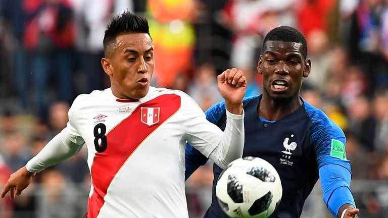 Christian Cueva and Paul Pogba in action at the Ekaterinburg Arena