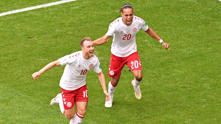 Christian Eriksen celebrates with Denmark's forward Yussuf Poulsen