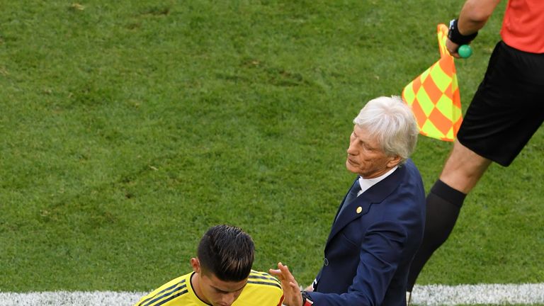 Jose Pekerman, Head coach of Colombia speaks to James Rodriguez of Colombia who looks dejected as he is substituted off due to injury during the 2018 FIFA World Cup Russia group H match between Senegal and Colombia at Samara Arena on June 28, 2018 in Samara, Russia.