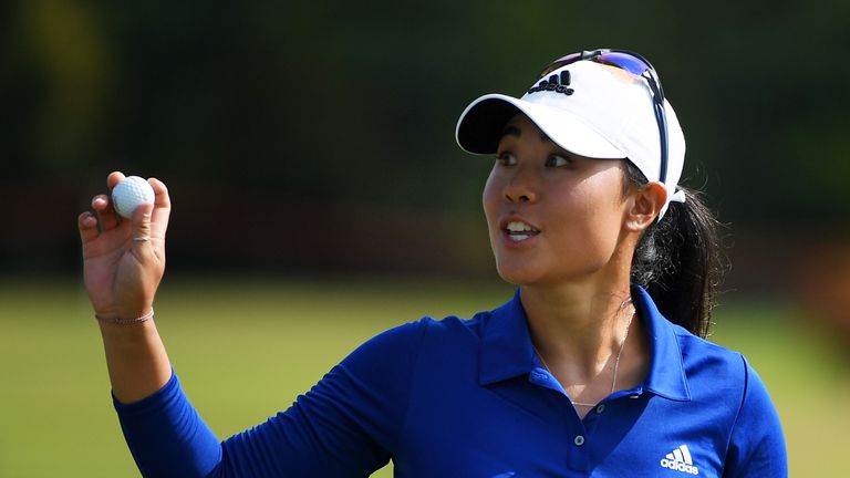 SINGAPORE - MARCH 04:  Danielle Kang of the United States reacts to her birdie on the second green during the final round of the HSBC Women's World Championship at Sentosa Golf Club on March 4, 2018 in Singapore.  (Photo by Ross Kinnaird/Getty Images)