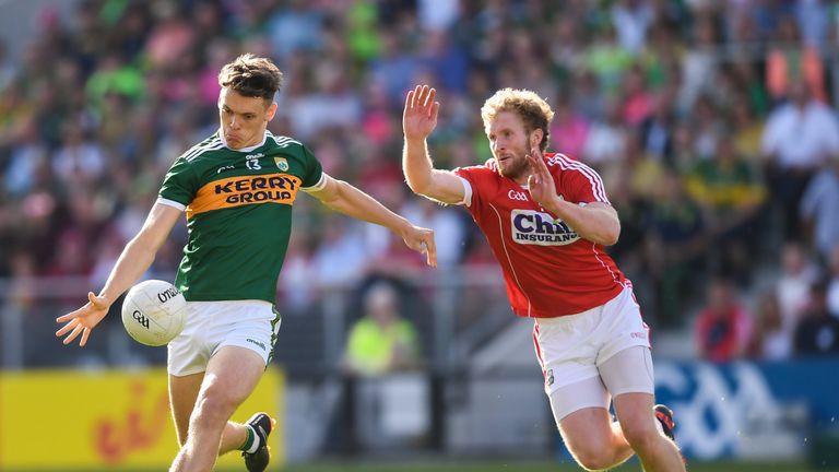 David Clifford of Kerry in action against Ruairi Deane of Cork